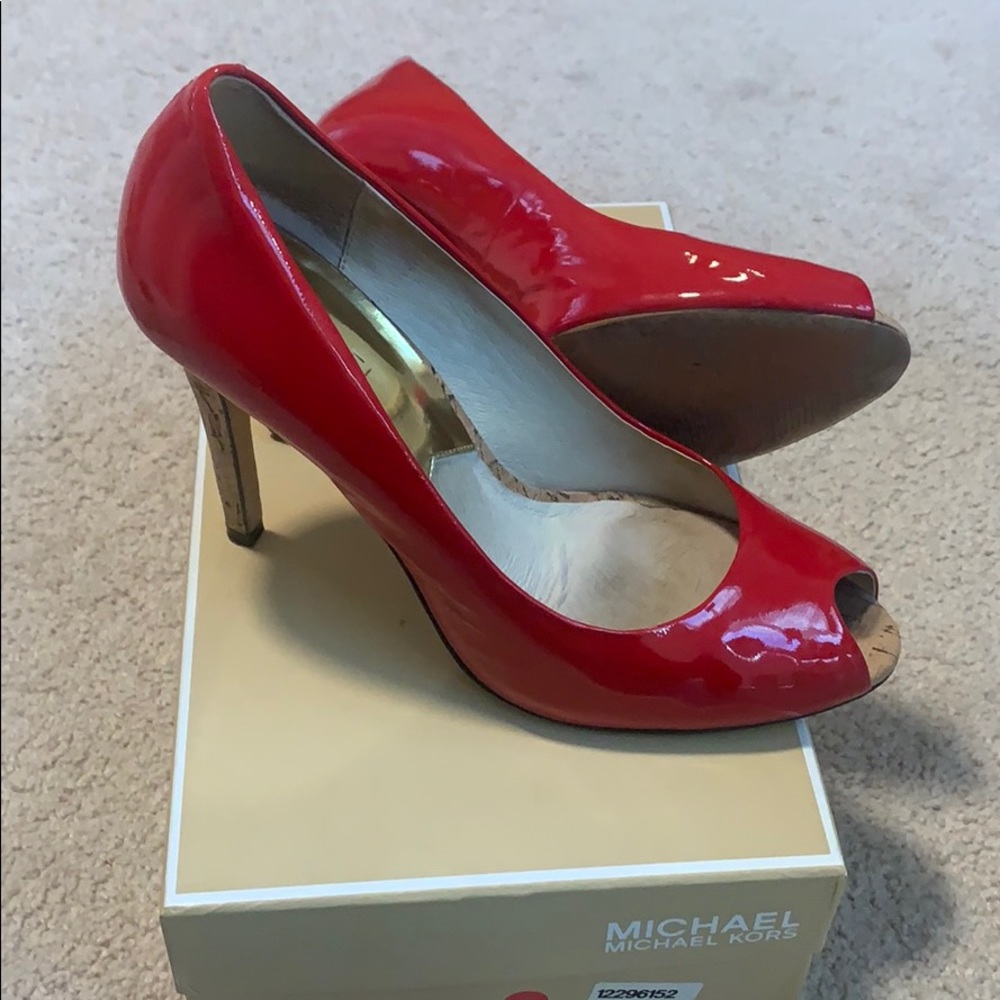 MK red patent heels
